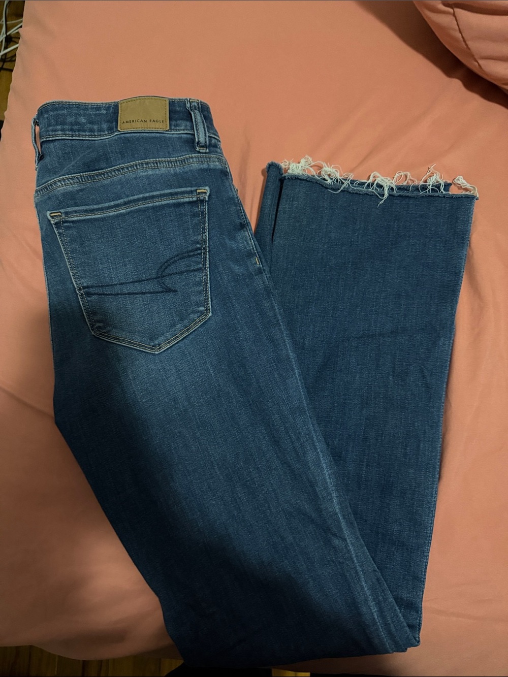 American Eagle Outfitters Women's Medium Blue Frayed Hem flared skinny jeans